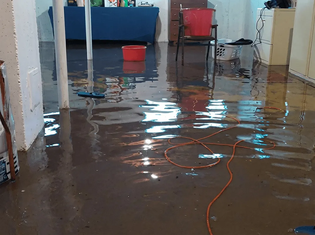 Basement with boiler, cabinets and washing machine completely flooded in Sarasota, FL